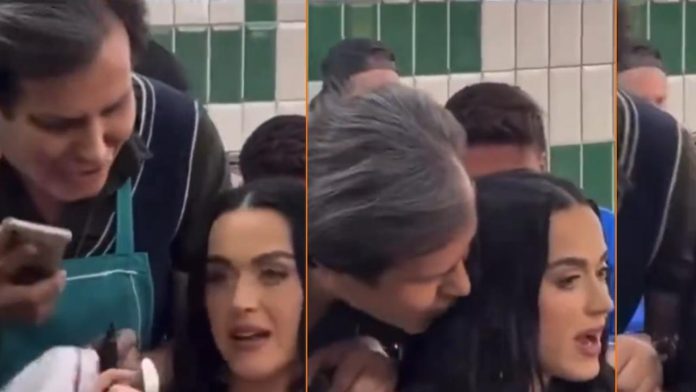 Katy Perry vive momento incómodo en taquería cuando un hombre intenta besarla; así reaccionó la cantante.