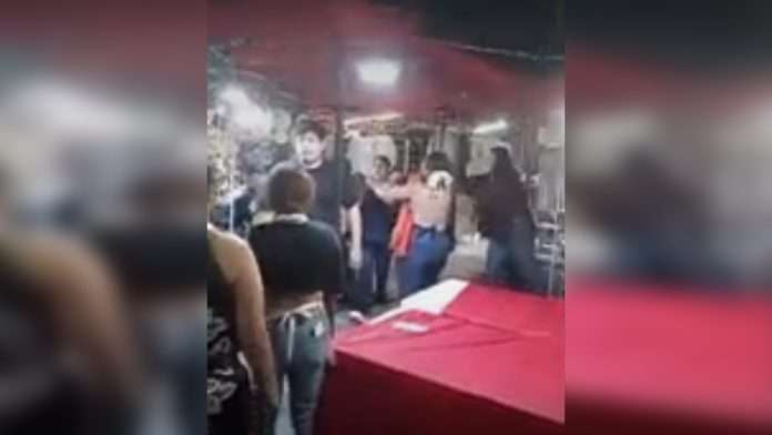 Pelea entre comerciantes
